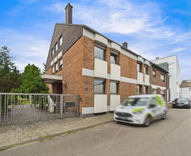 Repräsentatives Mehrfamilienhaus mit Gewerbeeinheit auf parkähnlichem Grundstück!