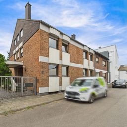 Repräsentatives Mehrfamilienhaus mit Gewerbeeinheit auf parkähnlichem Grundstück!