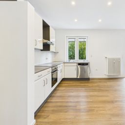 Moderne 3-Zimmer-Erdgeschosswohnung mit Terrasse und Garten am Stadtrand..
