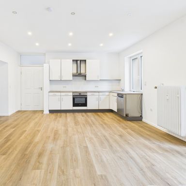 Moderne 3-Zimmer-Erdgeschosswohnung mit Terrasse und Garten am Stadtrand..