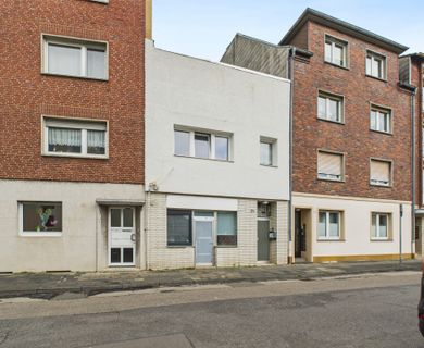 Mittendrin! Einfamilienhaus oder 2-Familienhaus mit Ladenlokal! Sie haben die Wahl