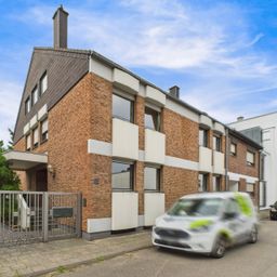 Repräsentatives Mehrfamilienhaus mit Gewerbeeinheit auf parkähnlichem Grundstück!