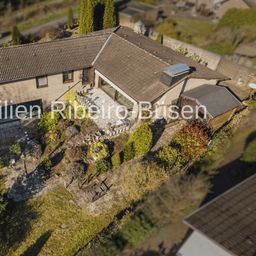 Ihr Rückzugsort im Grünen – Charmanter Winkelbungalow in traumhafter Lage